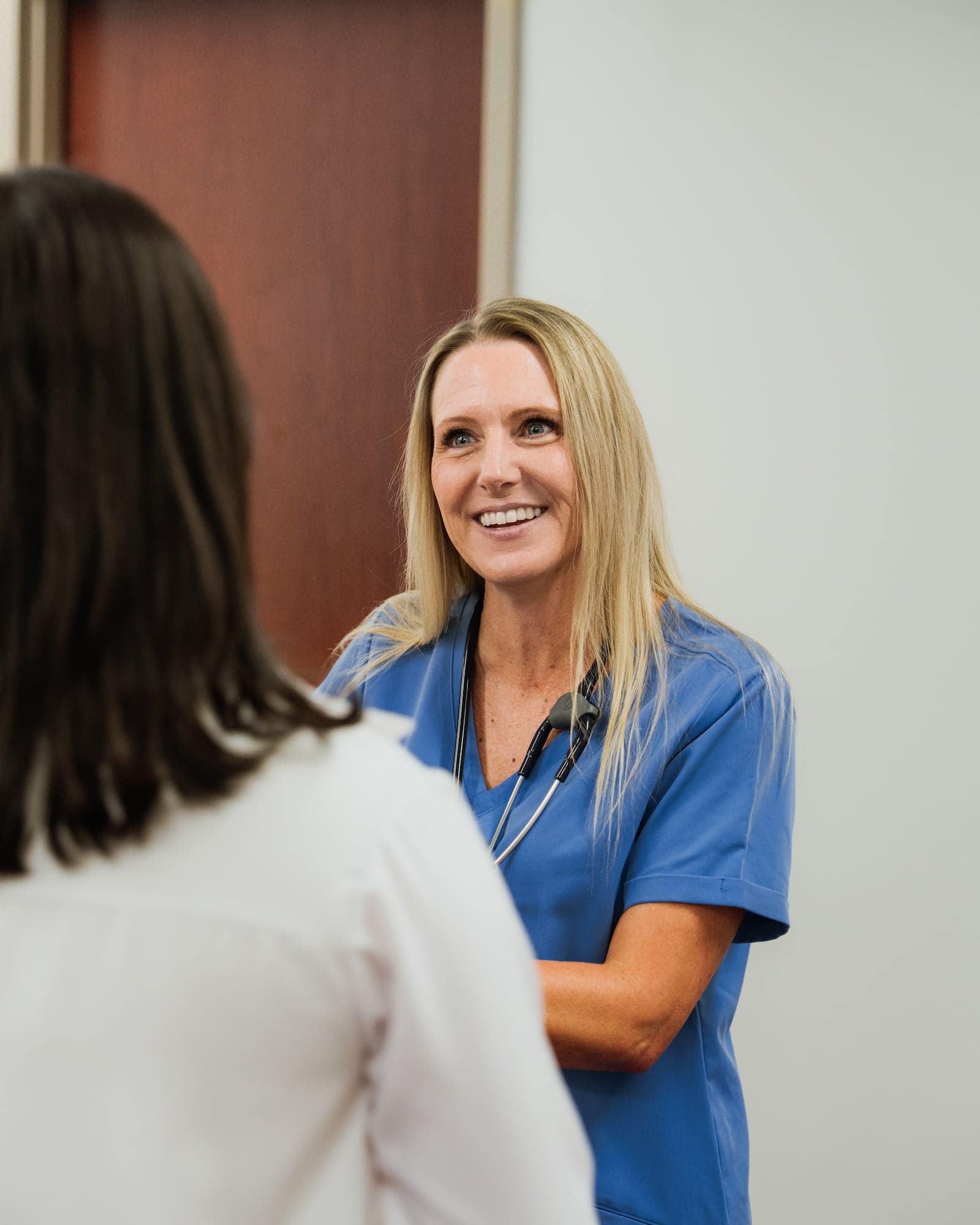Bookmark Medical provider smiling with a colleague